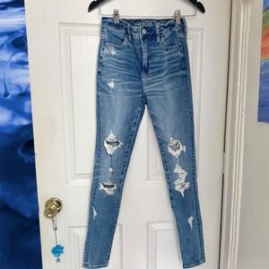 American Eagle High Waisted Blue Distressed Jeans The Dream Jean Size 2